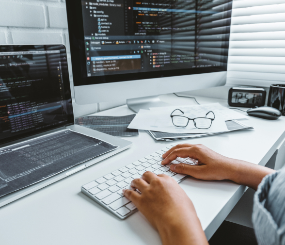 An iTech engineer working on integration software